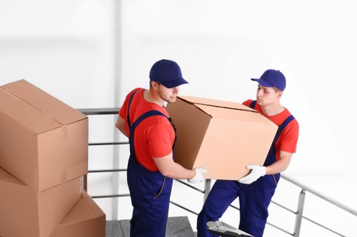 House removalists helping a family move into a Bow home