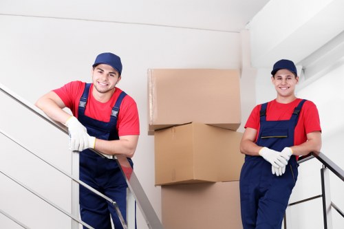Careful unloading of household items during a Bow van removal