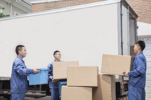 Staff member handling items during a careful move