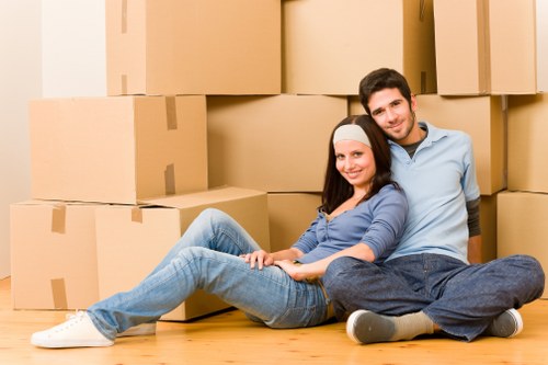 Packed boxes and furniture ready for a Bow house move