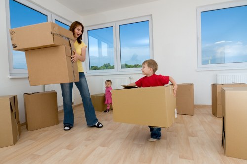 Removalists loading household furniture for a Bow property move